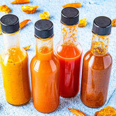 GMISUN Mini Hot Sauce Bottles 5 oz - 24 Pack Woozy Bottles with Black Caps, Shrink Capsules, Dripper Inserts, Funnel and Labels, Small Glass Bottle Dispenser for Homemade Hot Sauces, Dressings, Juice