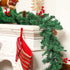 9 Ft Pre-lit Lighted Christmas Garland Decor, Festive Holiday Decoration for Outdoor/Indoor, Green Pine Branches with Red Berries and Pine Cones, Waterproof 50 Warm Lights with Timer