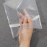 Wine Bottle Doggy Bag 100 Pack: Carryout Adhesive Seal Tamper Proof Travel Bags for Restaurants, Bars, and Dinner Parties (Clear)
