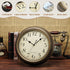 Plumeet Small Retro Wall Clock - 10'' Non Ticking Classic Silent Metal Clocks Decorative Kitchen Living Room Bedroom - Battery Operated (Brown)
