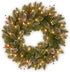 National Tree Company Pre-Lit Artificial Christmas Wreath, Green, Glittery Mountain Spruce, White Lights, Decorated with Pine Cones, Berry Clusters, Frosted Branches, Christmas Collection, 24 Inches