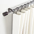Amazon Basics 1-Inch Wall Curtain Rod with Cap Finials - 36 to 72 Inch, Dark Bronze (Espresso)