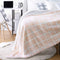 Amazon Basics Ultra-Soft Micromink Sherpa Blanket - Throw, Blush Grid