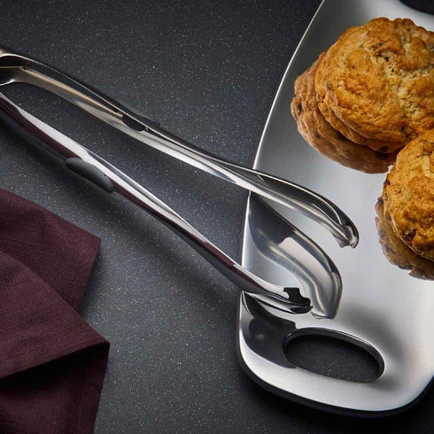 Nambe - Gourmet Collection - Curvo All-Purpose Tongs - Measures at 13" x 1.5" - Made with Stainless Steel - Designed by Steve Cozzolino