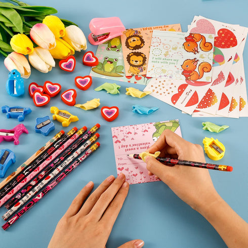 Valentines Day Gifts for Kids Classroom - 28 Packs Super Value Valentines Stationery Kit, Valentines Cards, Valentines Pencils, Erasers, Pen Sharpeners,Pen Holders,Valentine Exchange Party Favors Toys