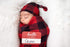Itzy Ritzy Cocoon & Hat Swaddle Set, Cutie Cocoon Includes Name Announcement Card & Matching Jersey Knit Cocoon & Hat Set, Perfect for Newborn Photos, for Ages 0 to 3 Months, Buffalo Plaid