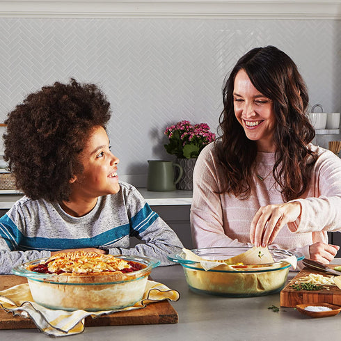 Pyrex | Clear Tempered Glass Pie Baking Dishes | Set of Two| 9.5" Deep, 60% Deeper than Pyrex Basic | Wide Handles for Extra Grip while Cooking & Baking | Doesn't Absorb Food Odors and Stains