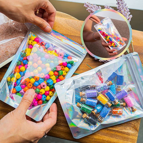 100 Pcs Holographic Resealable Mylar Bags - 5x7 Inch Smell Proof - Ziplock and Heat Sealable Stand Up Pouches - Use for Party Favors - Lip Gloss Packaging - Small Business Sample - WaldOaks