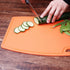 Liflicon Thick Silicone Cutting Board 12.6'' x 9.1'' Juice Grooves Easy Grip Handle Dishwasher Safe-Orange
