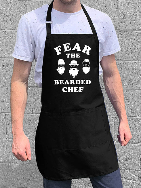 ApronMen, Fear The Bearded Chef Apron, Professionally Printed Funny BBQ Grilling Aprons for Men (Black) - Adjustable One Size Fits All - 100% Cotton - Mens Apron With Pockets